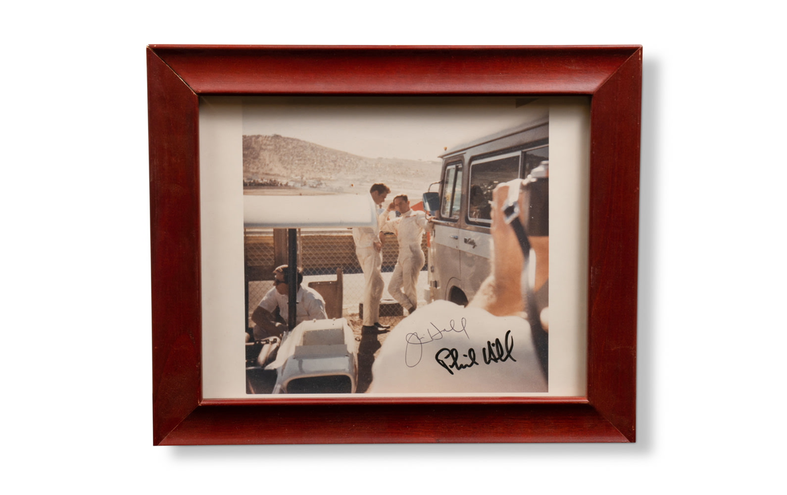 Signed Photograph of Phil Hill and Jim Hall at Laguna Seca, 1966