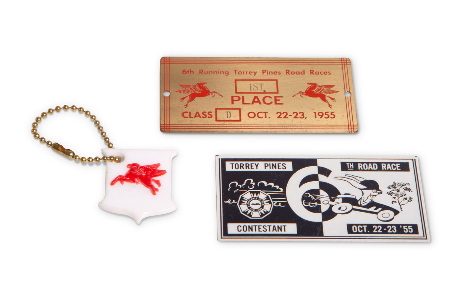 1955 Torrey Pines Road Races 1st Place Badge, Contestant Badge, and Mobil Oil Fob