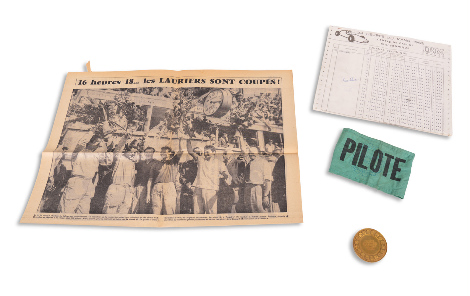 1962 24 Hours of Le Mans Driver Armband, Timesheets, Local Newspaper, and Pilote Coin