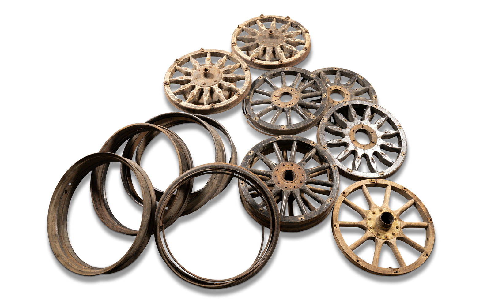 Assorted Wooden-Spoke Wheels, Steel Rims, and Lockrings