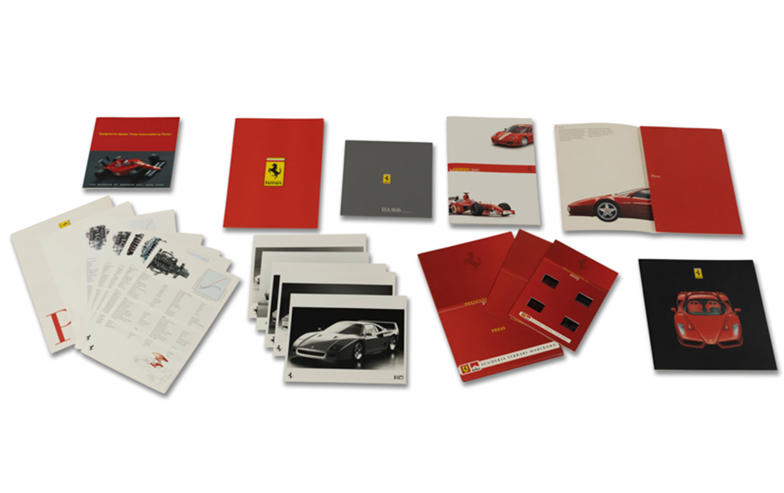 Assorted Ferrari Press and Promotional Materials, Including 2003 Press Kit with F2003-GA Photo Slides