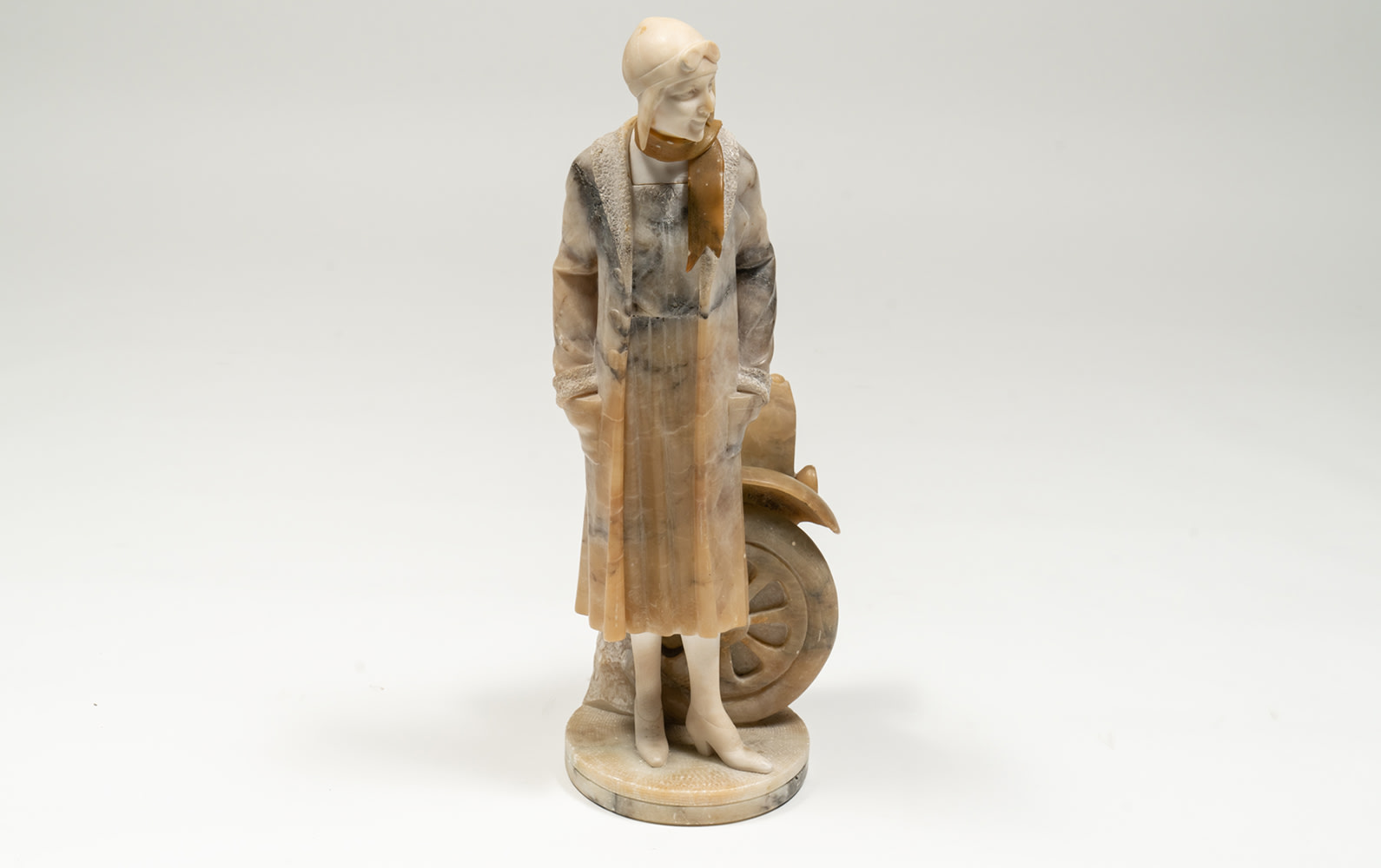 c.Late 1920s–Early 1930s Marble Sculpture of a Female Motorist