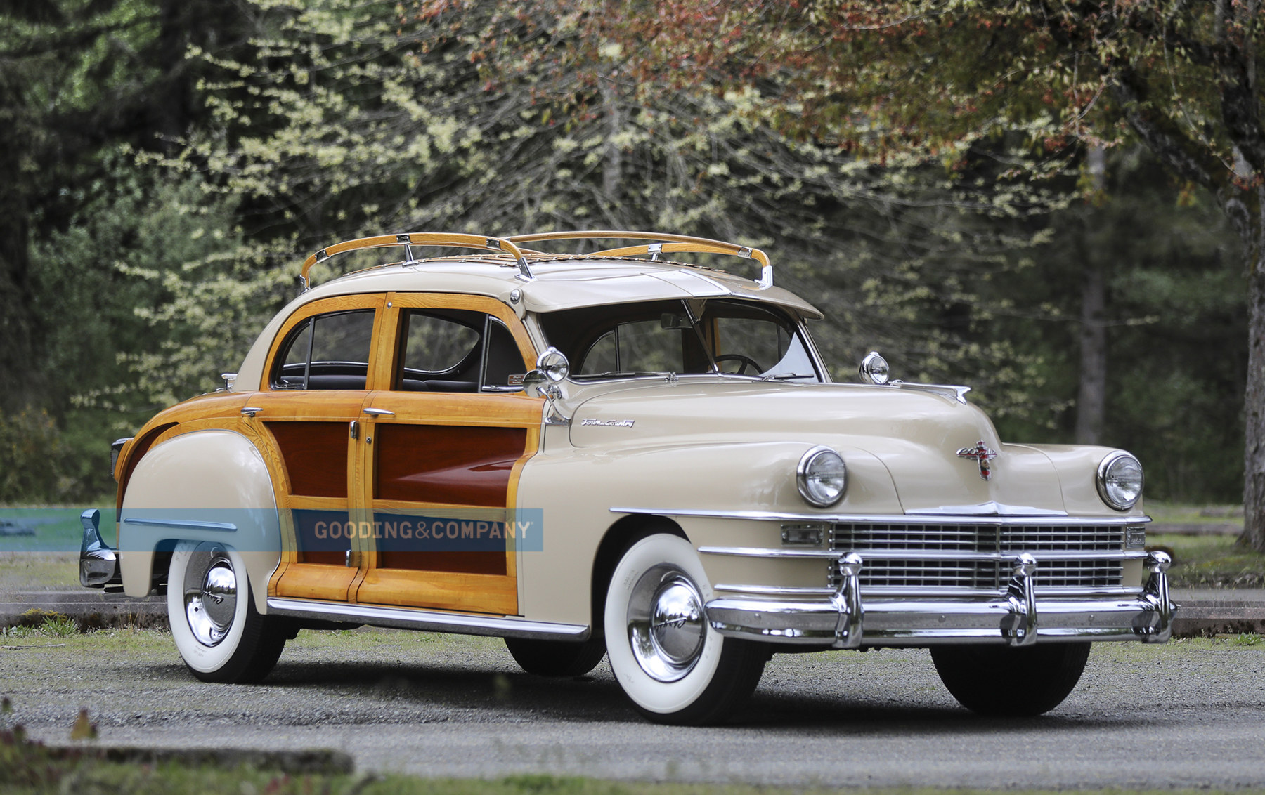 https://media.goodingco.com/image/upload/c_fill,g_auto,q_88,w_1800/c_fill,g_center,l_WM,q_88,w_1800/v1/Prod/PB24_Pebble%20Beach%20Auctions%202024/672_1948%20Chrysler%20Town%20and%20Country%20Sedan/1948_Chrysler_Town_Country_Sedan_3_fzwyih