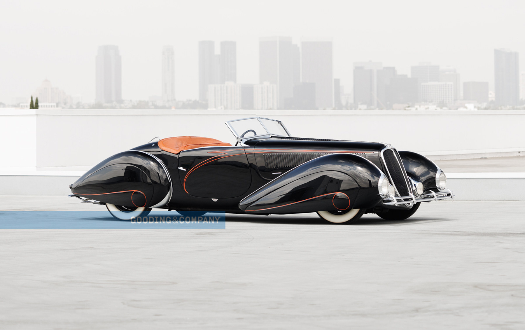 https://media.goodingco.com/image/upload/c_fill,g_auto,q_88,w_1800/c_fill,g_center,l_WM,q_88,w_1800/v1/Prod/PB24_Pebble%20Beach%20Auctions%202024/691_1937%20Delahaye%20135M%20Torpedo%20Roadster/1937_Delahaye_135M_Torpedo_Roadster_38_o85pqs