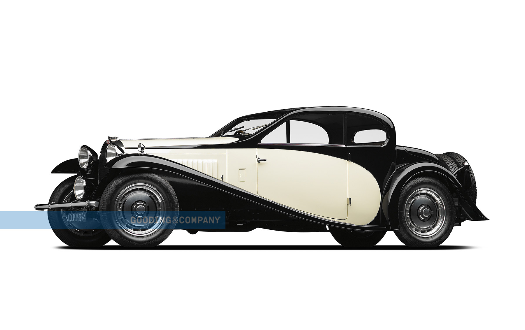 https://media.goodingco.com/image/upload/c_fill,g_auto,q_88,w_1800/c_fill,g_center,l_WM,q_88,w_1800/v1/Prod/PM24_Mullin%20Collection%202024/1123_1930%20Bugatti%20Type%2046%20Semi-Profile%20Coupe/1929_Bugatti_Type_46_SP_10_n7m7ux