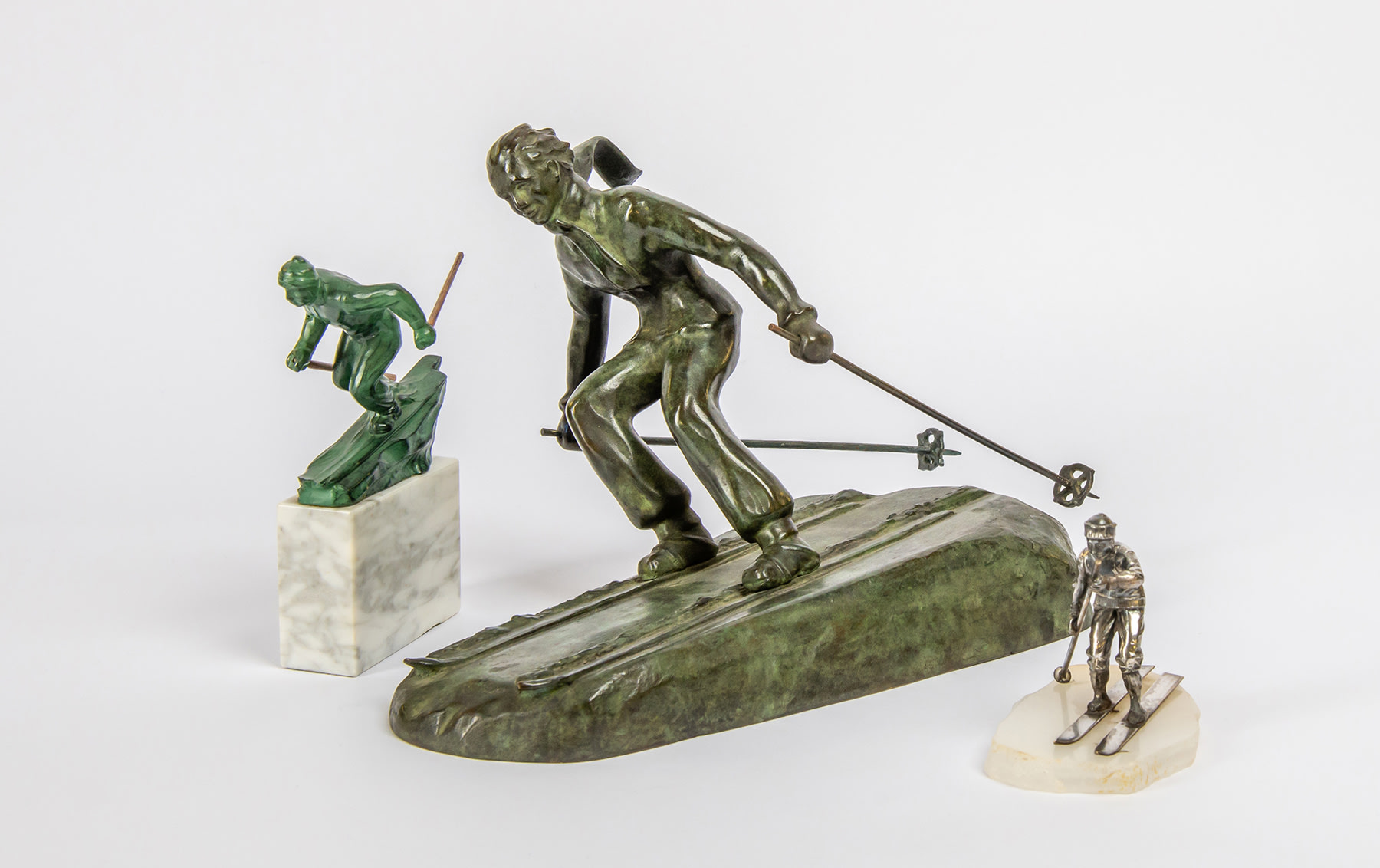 Trio of Bronze Ski Figures, 1920s and 1930s