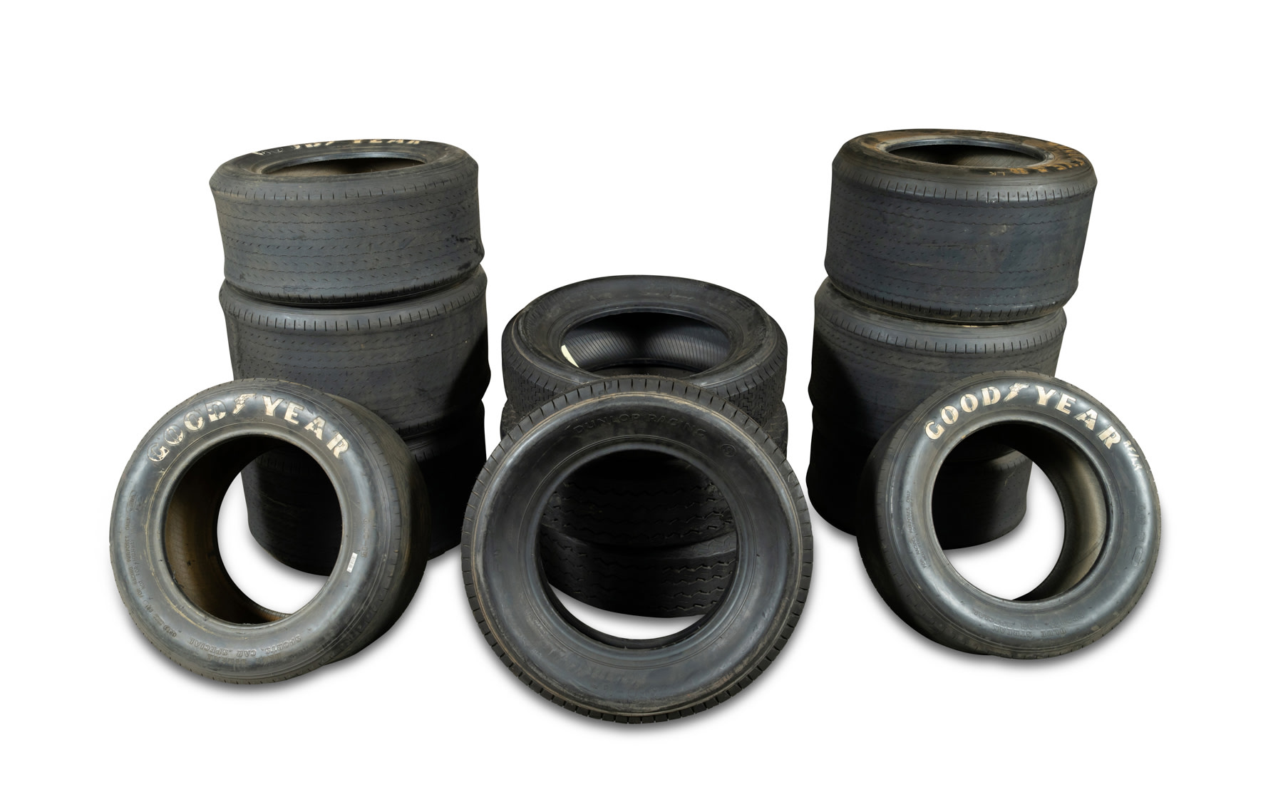 12 Racing Tires, Including Eight Goodyear, Two Dunlop, and Two Winston