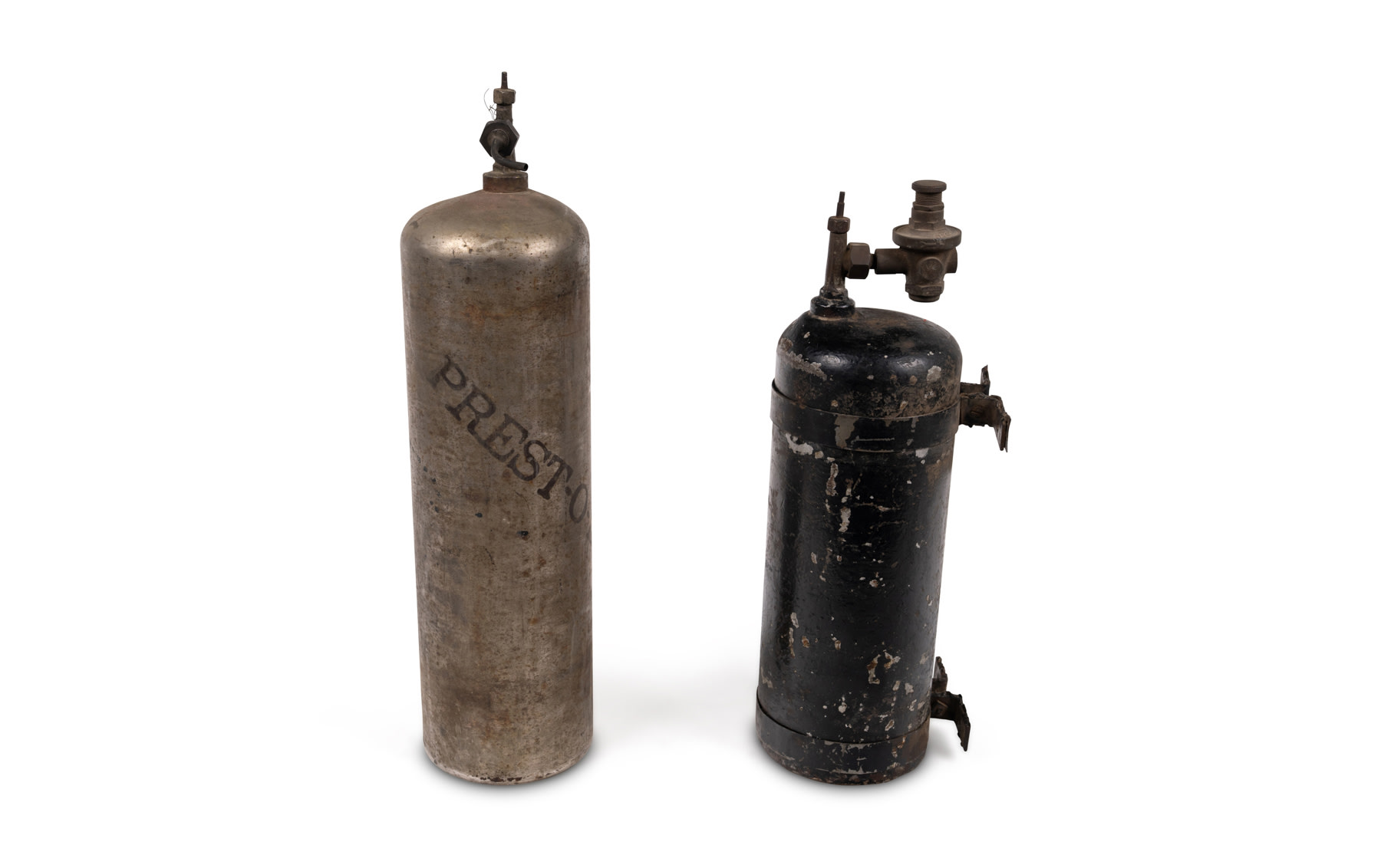 Two Acetylene Headlight Tanks, Including One by Prest-O-Lite