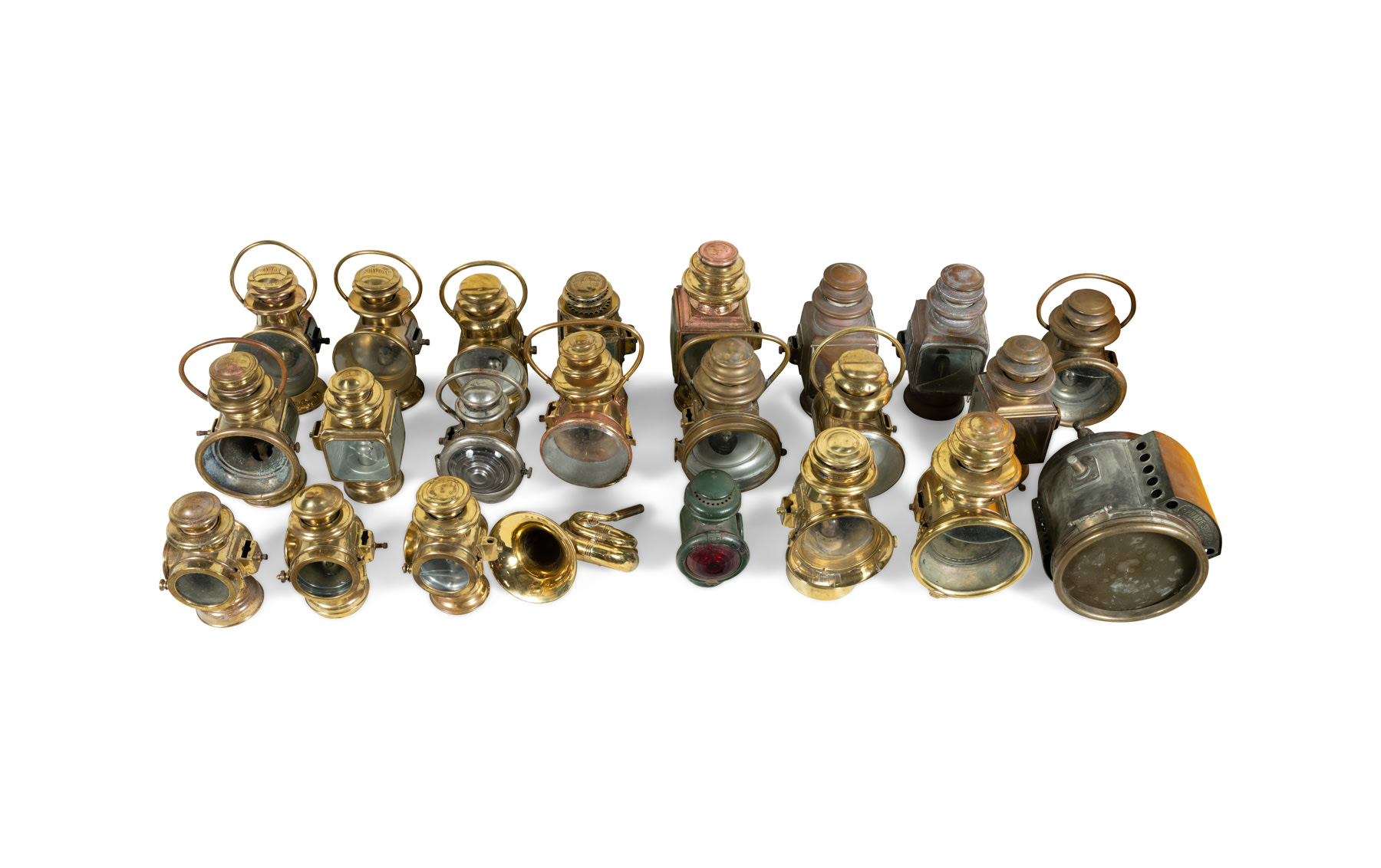 21 Assorted Brass Lamps, a Spotlight, and a Horn
